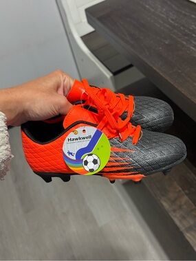 Hawkwell Kids' Soccer Cleats in Neon Orange and Charcoal Gray